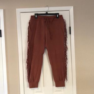 Kittenish fringe joggers